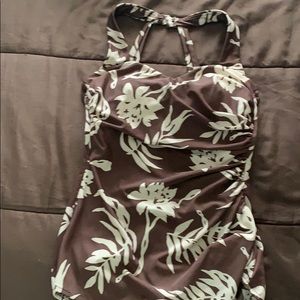 Vintage swimsuit with a front skirt. No skirt in back as shown in picture.